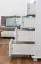 Schmaler Kleiderschrank | 1 Drehtür | 4 Schubladen | mit Kleiderstange | 80 cm breit | Massivholz Kiefer | Farbe: Weiß Abbildung
